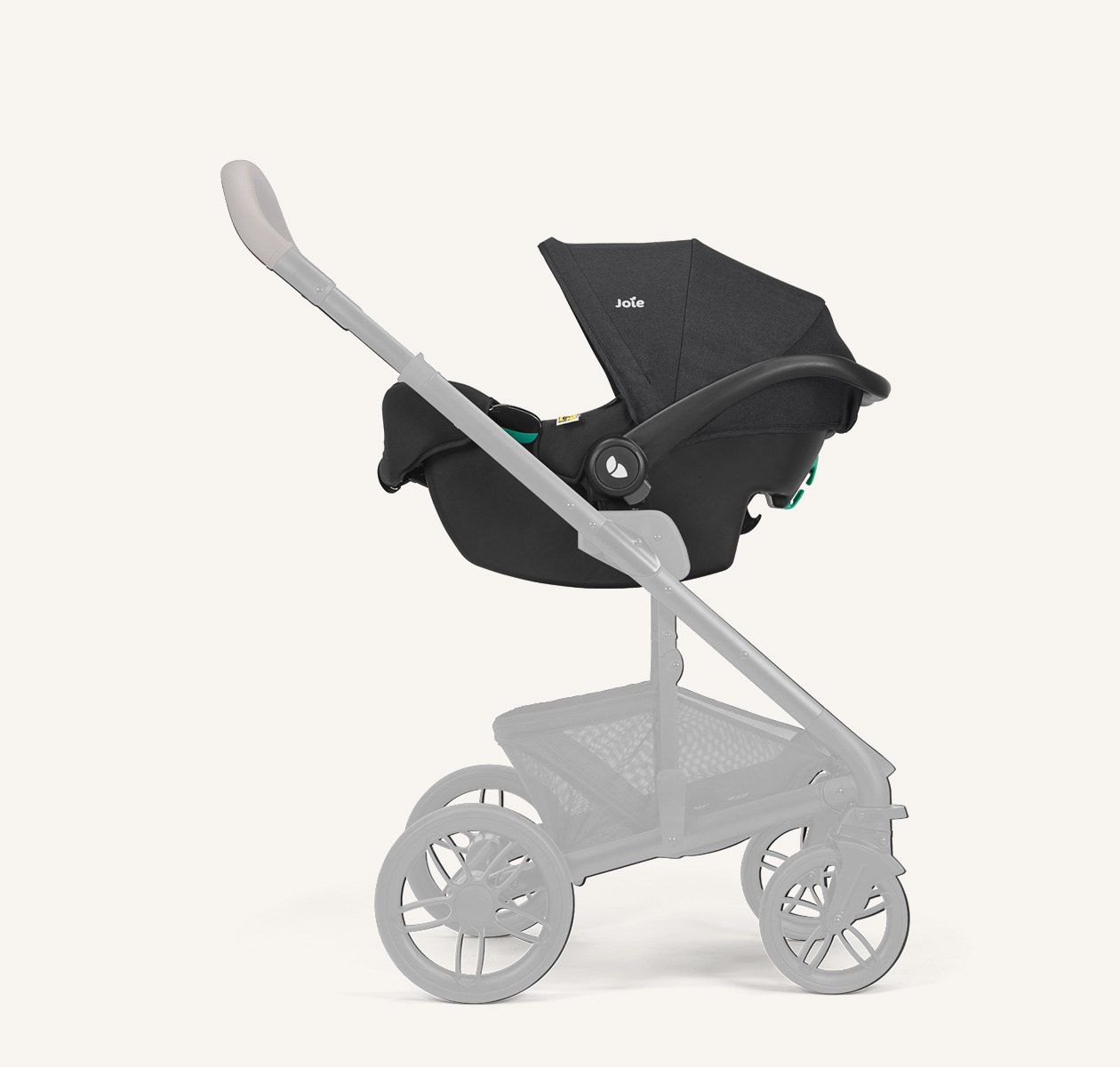 Coque Joie i-Snug 2 posée sur un châssis de poussette
