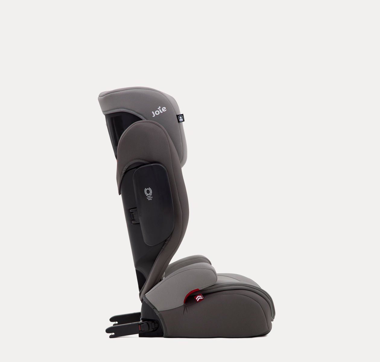 Le rehausseur Joie Traver vu de profil, avec ses connecteurs ISOFIX à l'arrière.