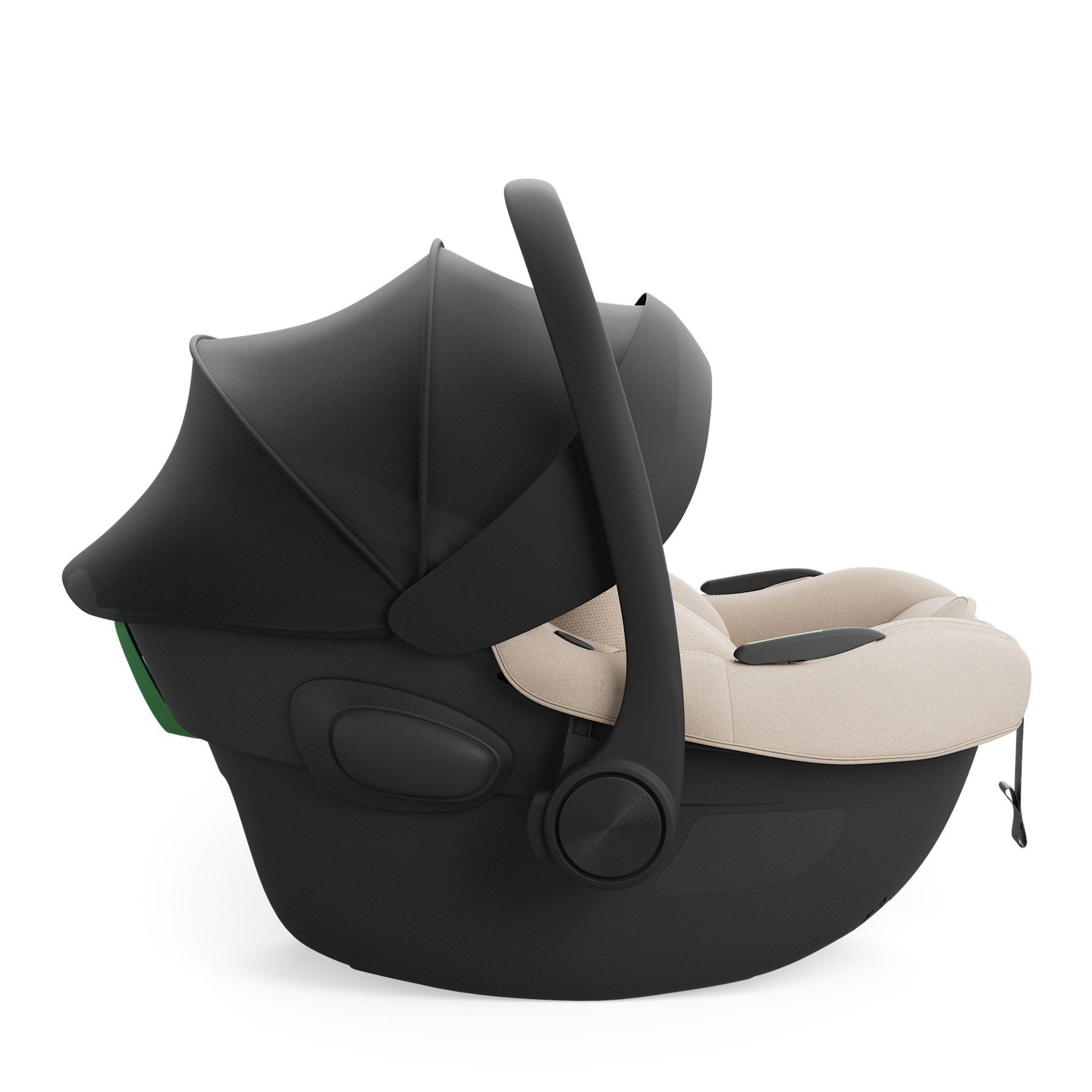 Coque Kinderkraft I-Lite vue de profil, capote dépliée et poignée relevée, sur sa base.